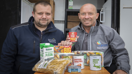 Bryson Recycling centre Mochdre now have a drop of point for food donations on behalf of Crest.  Gareth Walsh from Bryson with  Rod Williams from Crest.             Picture Mandy Jones