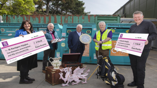 Bryson Recycling cheque presentations to St Kentigern hospice and St Davids Hospice.        Pictured from left; Wendy Clark; community fundraiser' St Kentigern hospice Cllr Geoff Stewart; lead member for waste Conwy Council, Cllr Barry Mellor ; Lead member for environment and transport,  Mark Ellis of Bryson and Adrian Owen; fundraising manager; St Davids hospice.               Picture Mandy Jones